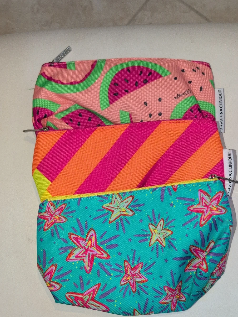 Clinique Bright Watermelon, Neon Stripe & Teal Star Pouch Trio Cosmetics Bags